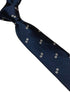 navy blue tie with dice embroidered design